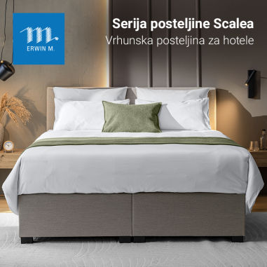 Bettwäsche Scalea präsentiert auf einem Boxspringbett in einem Hotelzimmer